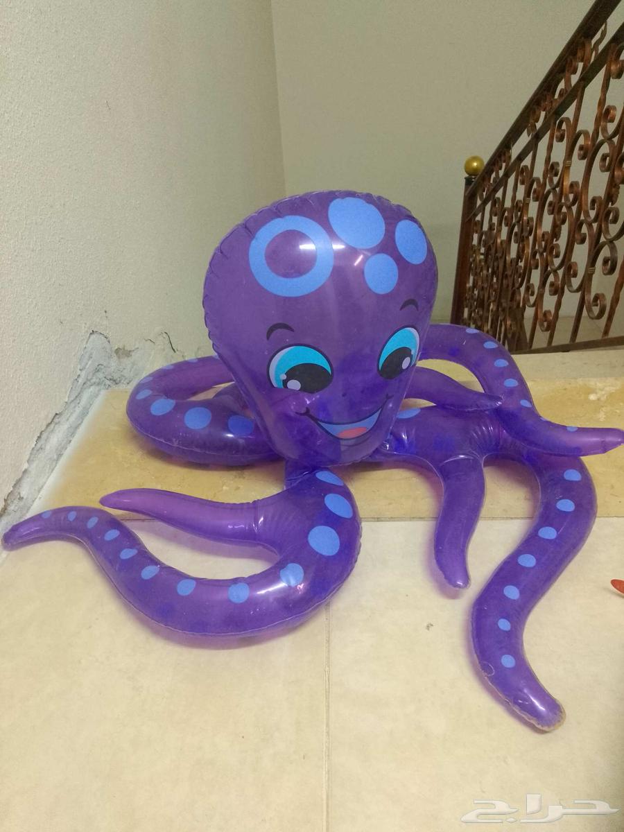 Children's pool, two swimming goggles, and an octopus float64500270852738112