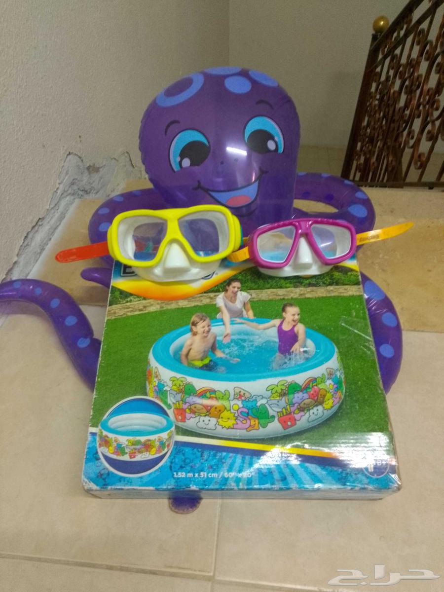 Children's pool, two swimming goggles, and an octopus float64500270852738110