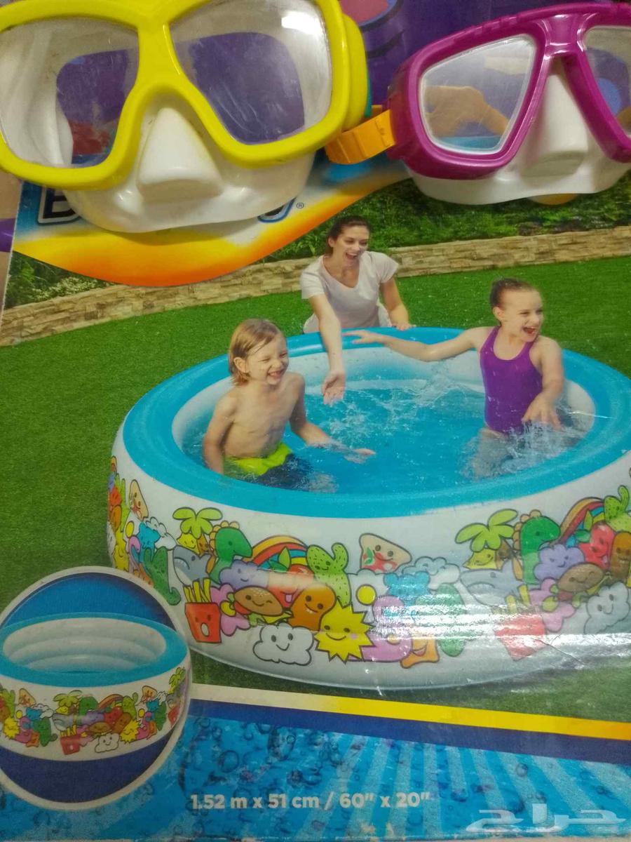 Children's pool, two swimming goggles, and an octopus float64500270852738111