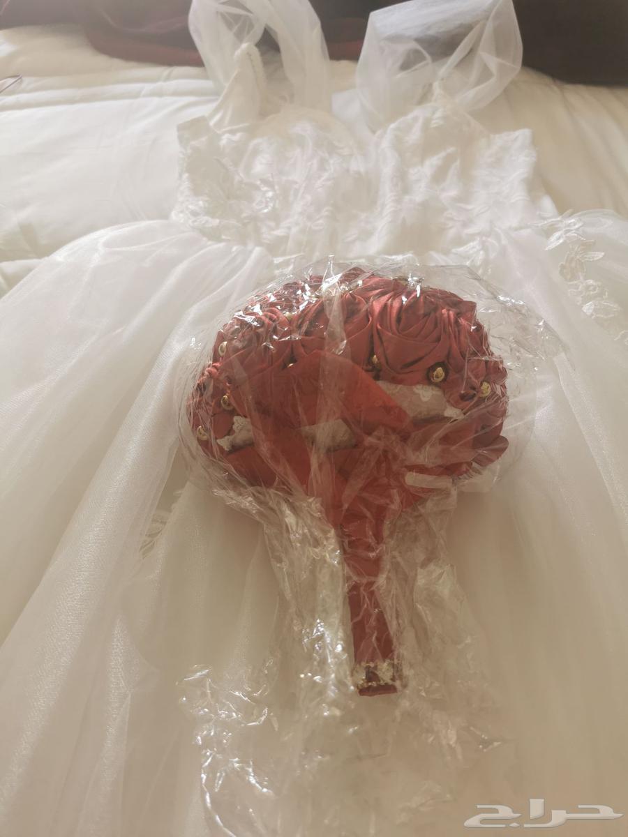 فستان زواج جديد ومسكه ورد جديده64504722492418111