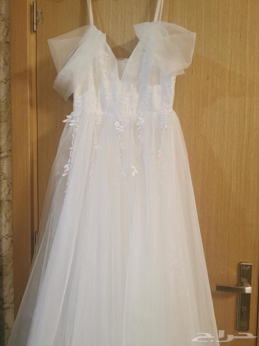 فستان زواج جديد ومسكه ورد جديده64504722492418112