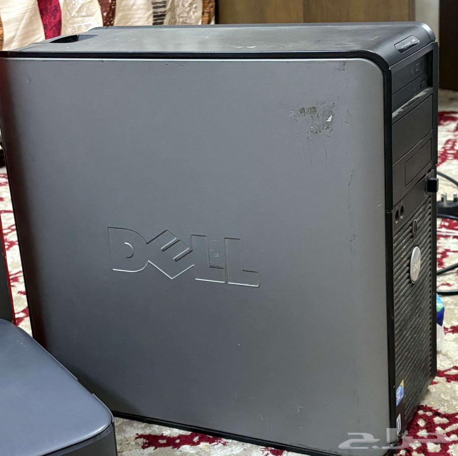 A computer with a screen and two printers64504626872835110