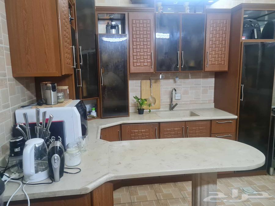 مطبخ حرف L مع جزيرة في الوسط64509757230851110