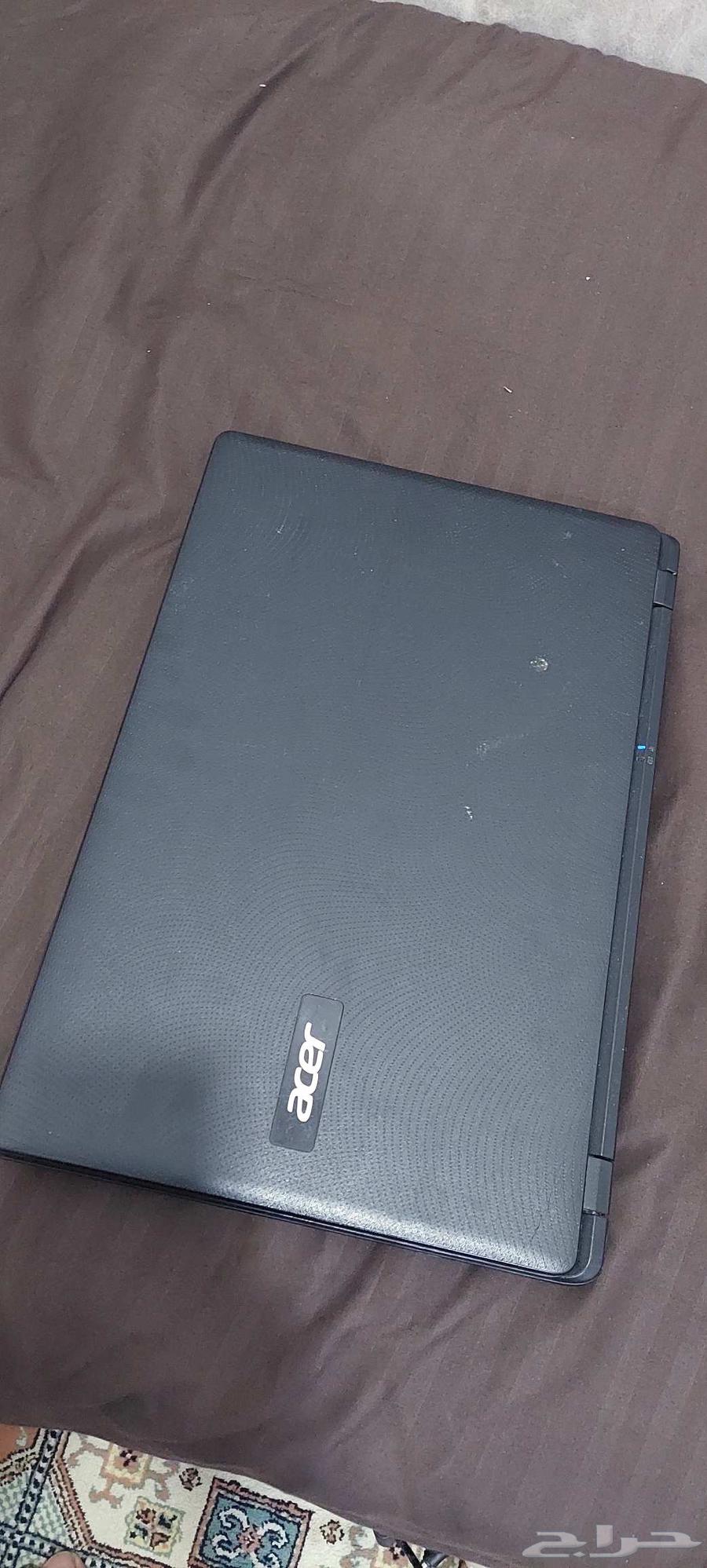 Used Acer laptop with a minor scratch on the lid64517988914945113