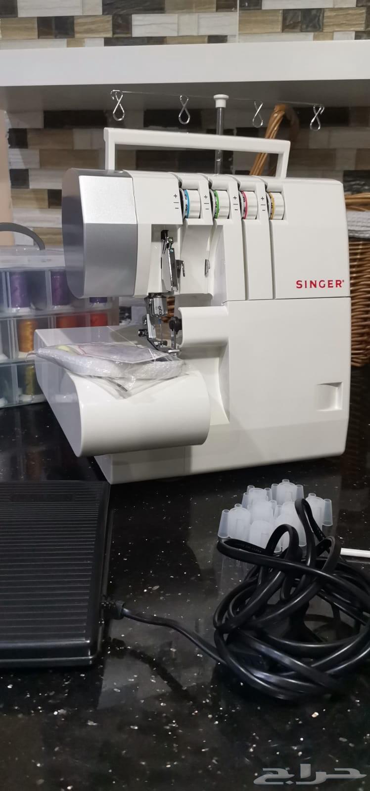 آلة خياطة أوفرلوك سينجر مع جميع الملحقات تم شرائها من موقع64523752875906110