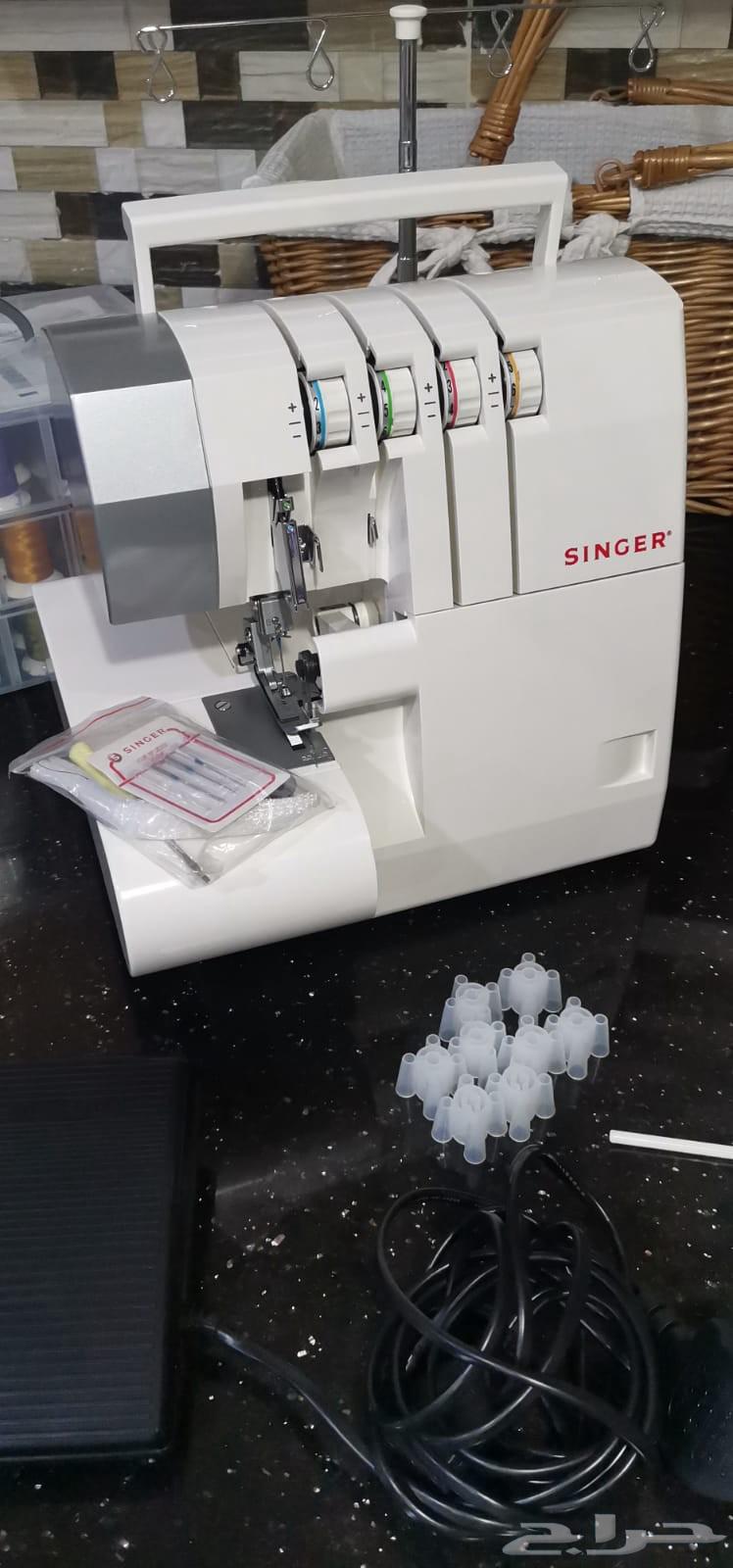 آلة خياطة أوفرلوك سينجر مع جميع الملحقات تم شرائها من موقع64523752875906112