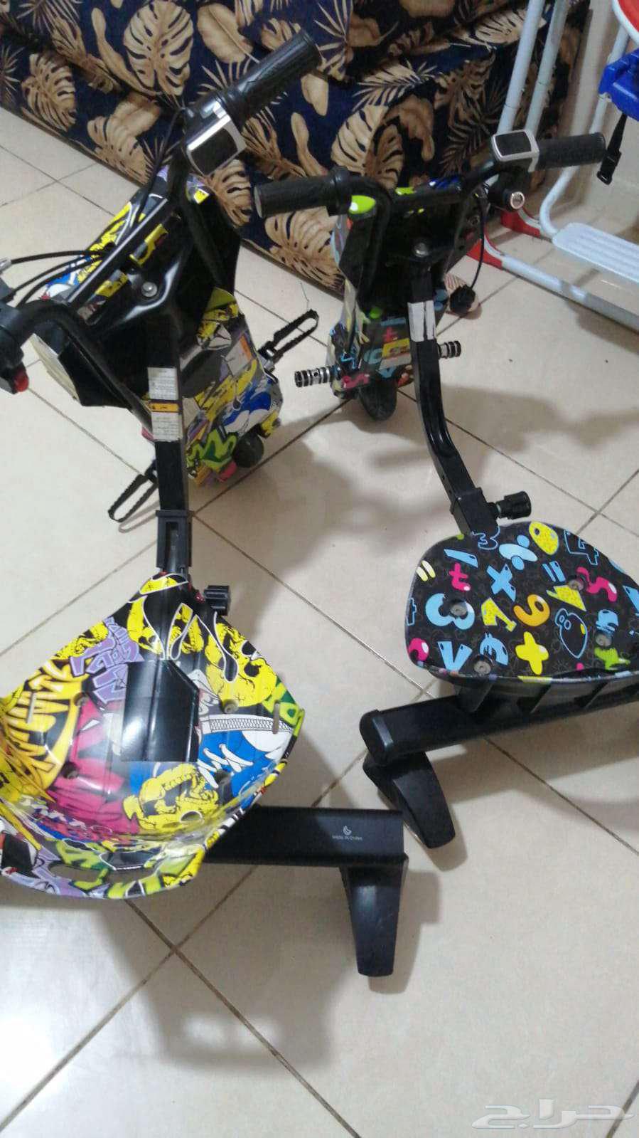 Two scooters for sale, new, one large and one small64520090996482113