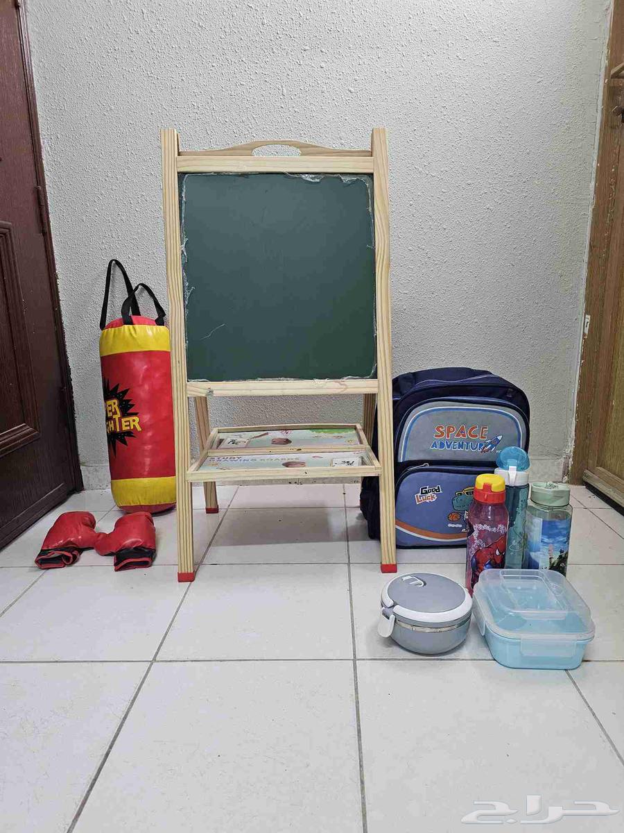 Whiteboard, punching bag, and school bag64530571905411110