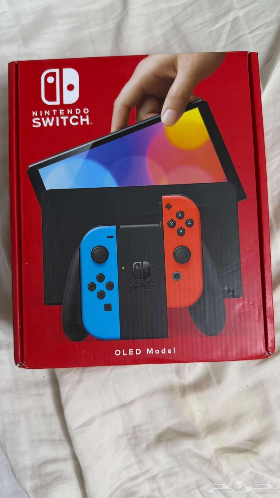 Nintendo Switch OLED Unused with Games and Case64540481892994110