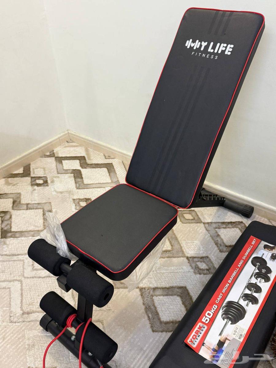 أوزان 50 كليو وكرسي الأوزان شبه جديده64539244835459110