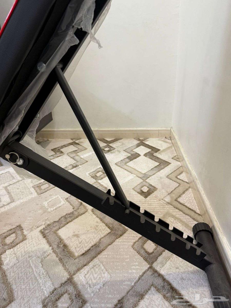 أوزان 50 كليو وكرسي الأوزان شبه جديده64539244835459112