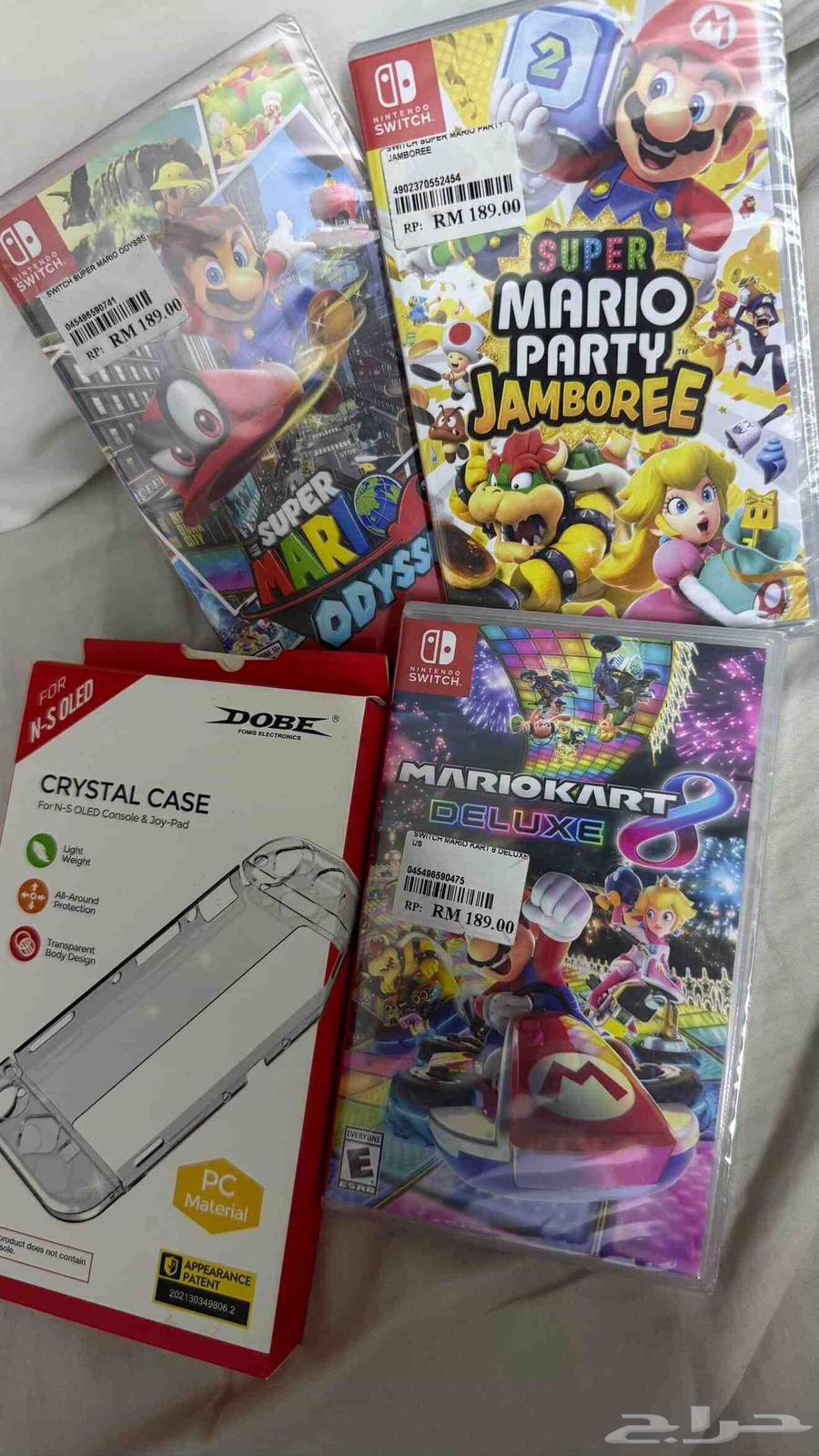 Nintendo Switch OLED Unused with Games and Case64540481892994114