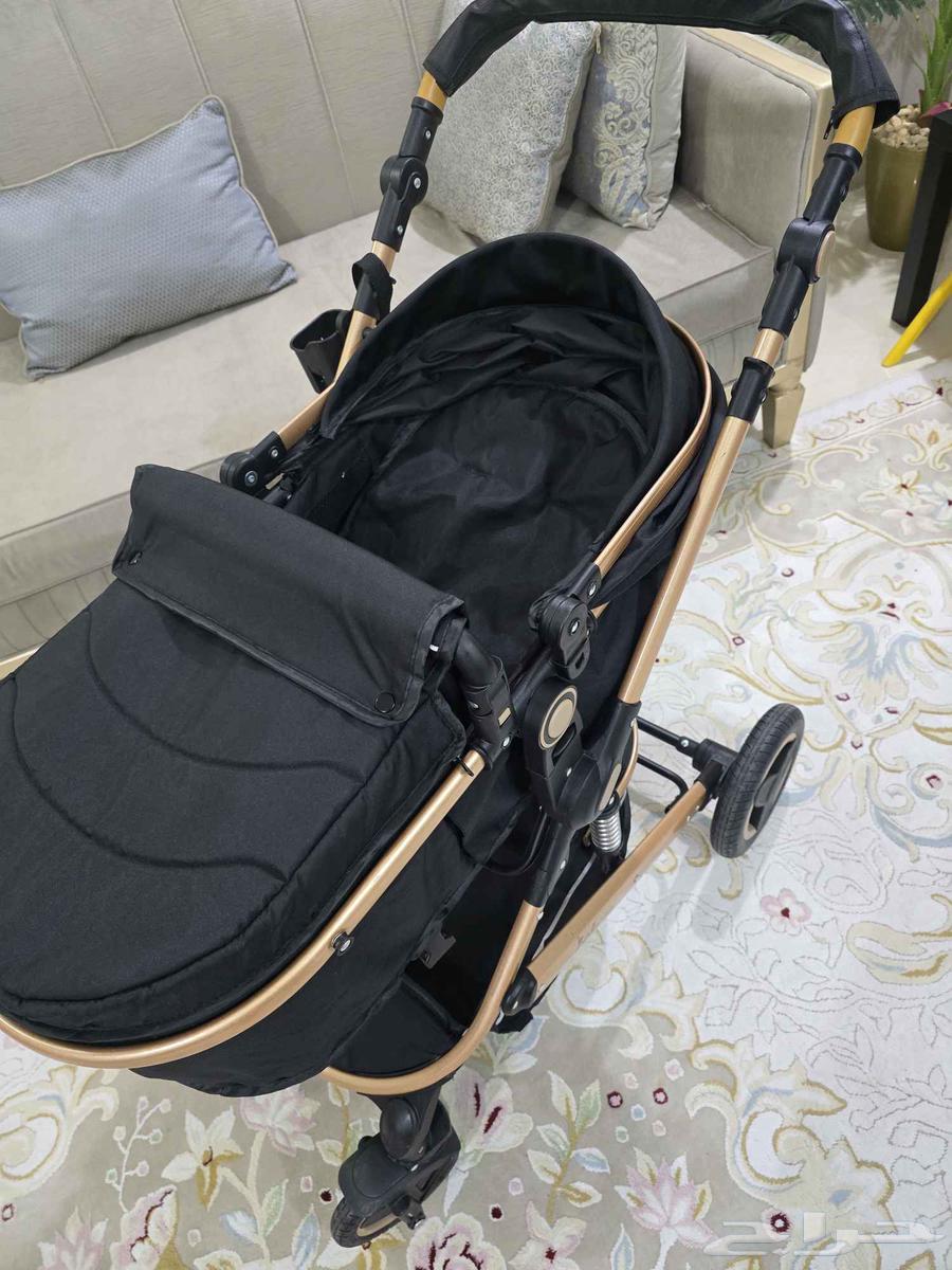 عربة اطفال وكرسي هزاز64542147295490112