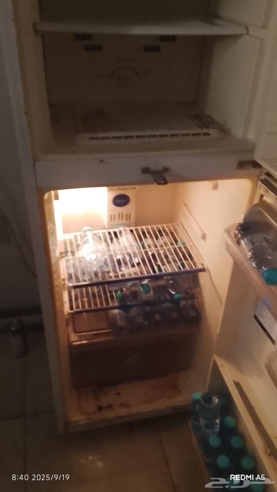 Two refrigerators for sale, one large and one small64536809150977114