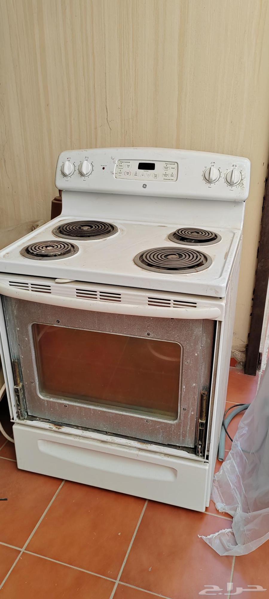 غسالة ملابس عادية مستعملة للبيع وفرن كهربائي64536252102145113