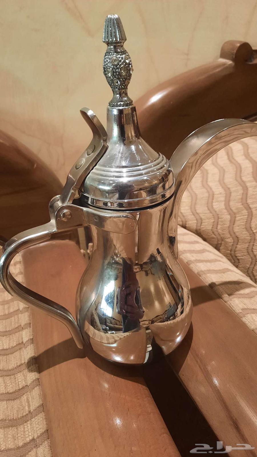 4 original dallahs from Al-Saif company, except for the smallest silver one64409643673089113