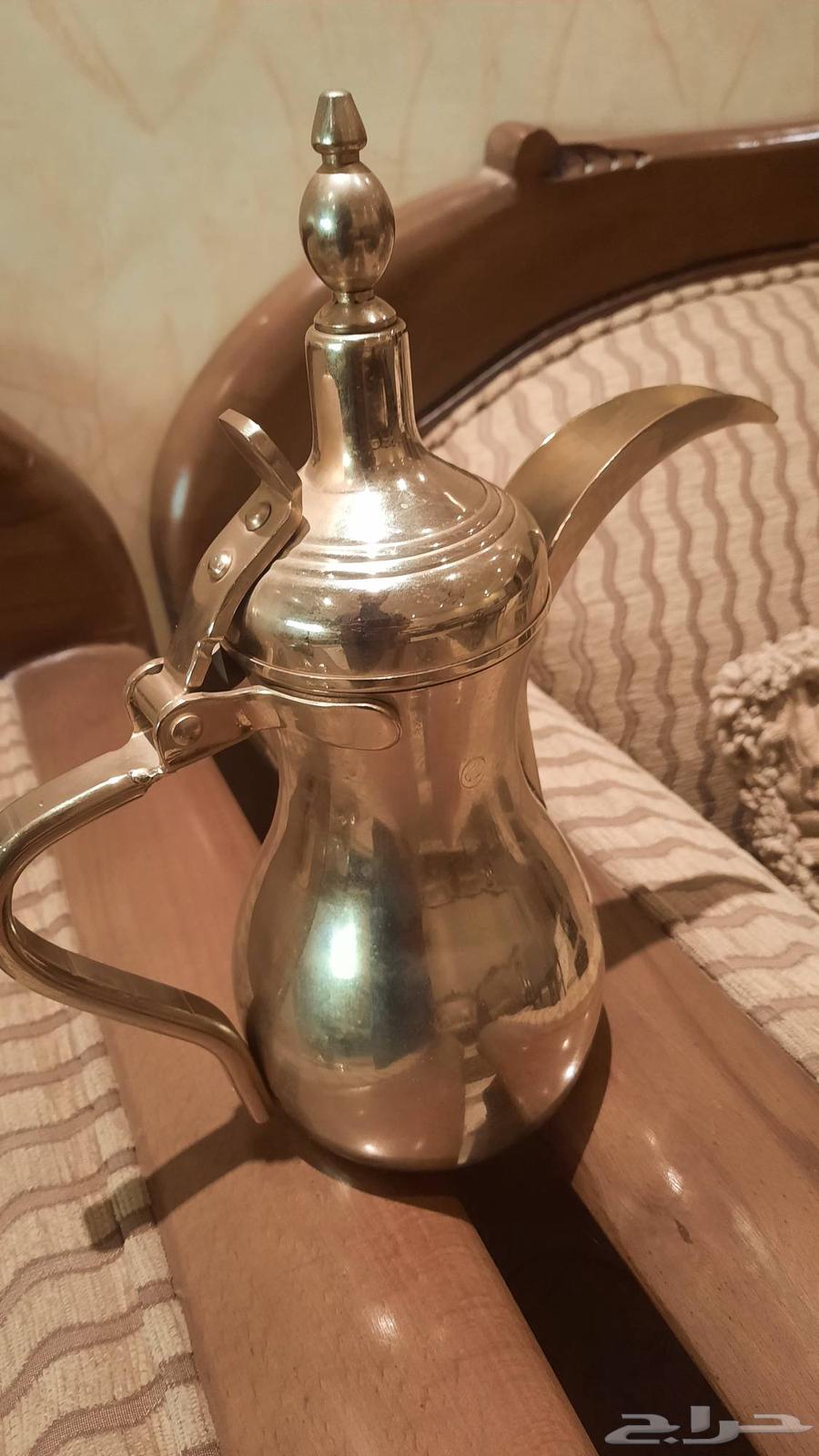 4 original dallahs from Al-Saif company, except for the smallest silver one64409643673089110