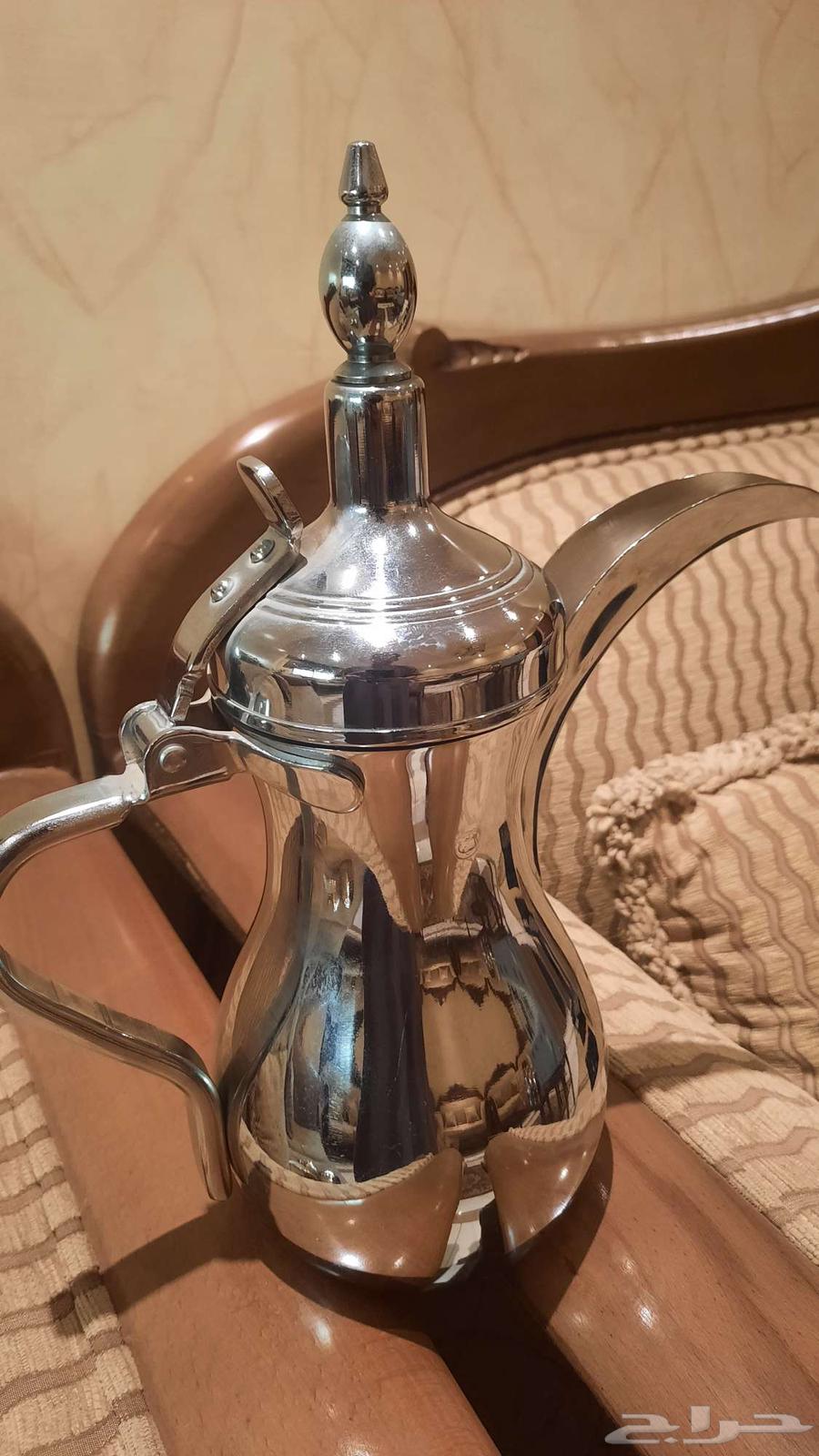 4 original dallahs from Al-Saif company, except for the smallest silver one64409643673089111