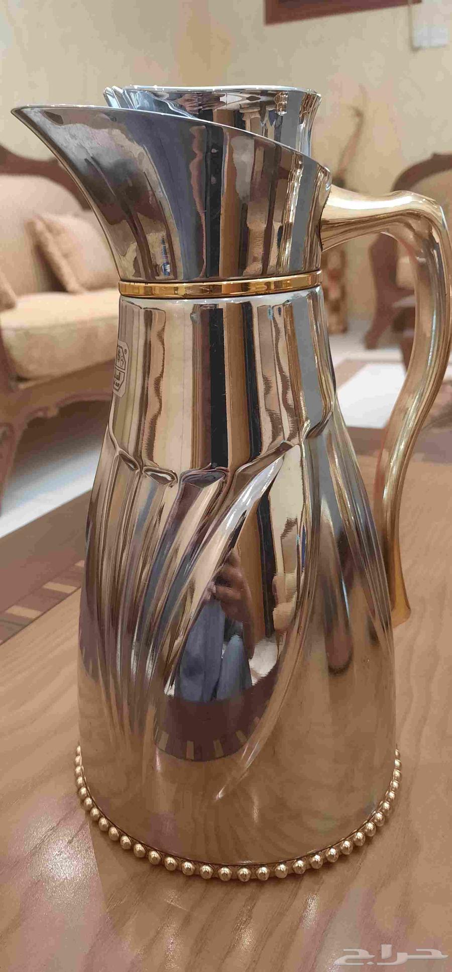 4 original dallahs from Al-Saif company, except for the smallest silver one64409643673089114