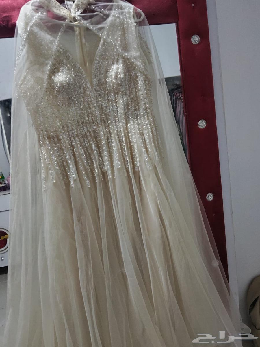 فستان جديد لبسته مره وحده مع حزمه وشنطه جديد ابيع في 40064545160757506113