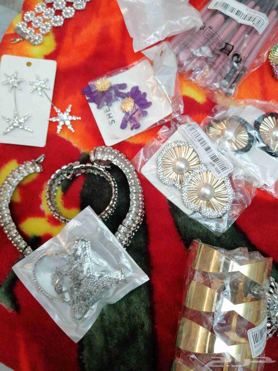 Two new abayas, each size 56 and 57, one is blue and one comes64548645809153114