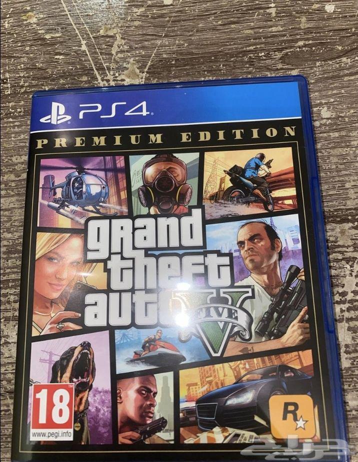 Sony 4 for sale with imitation controller, Grand Theft Auto tape, and cables64552463035523112