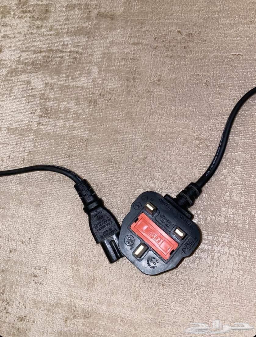 Sony 4 for sale with imitation controller, Grand Theft Auto tape, and cables64552463035523114