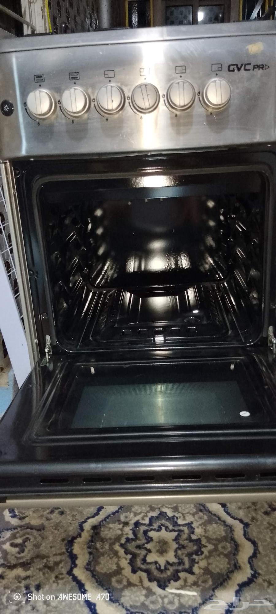 فرن اربع شعلات مع شوايه نضيف جدا  رقم للتواص64545431314433112