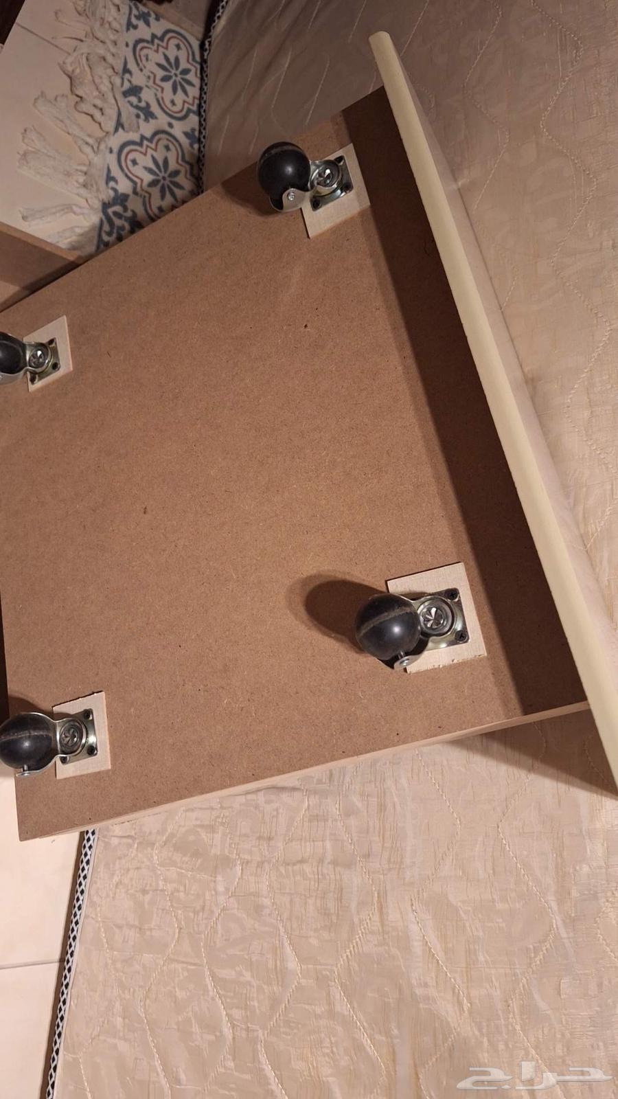 4 chairs with wheeled storage units under the beds64554649104769112