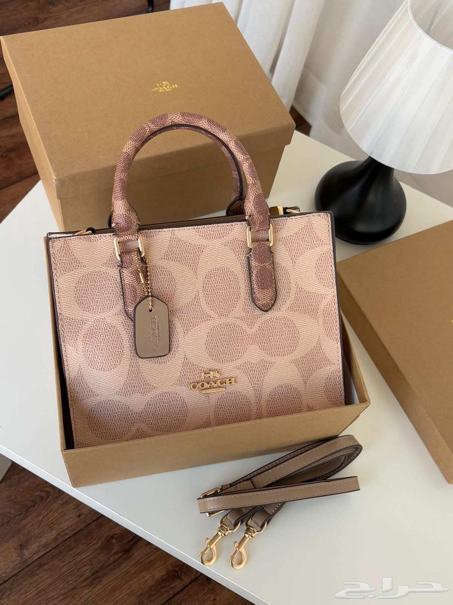 شنط ماركة كوتش درجه اولى64553737099393112