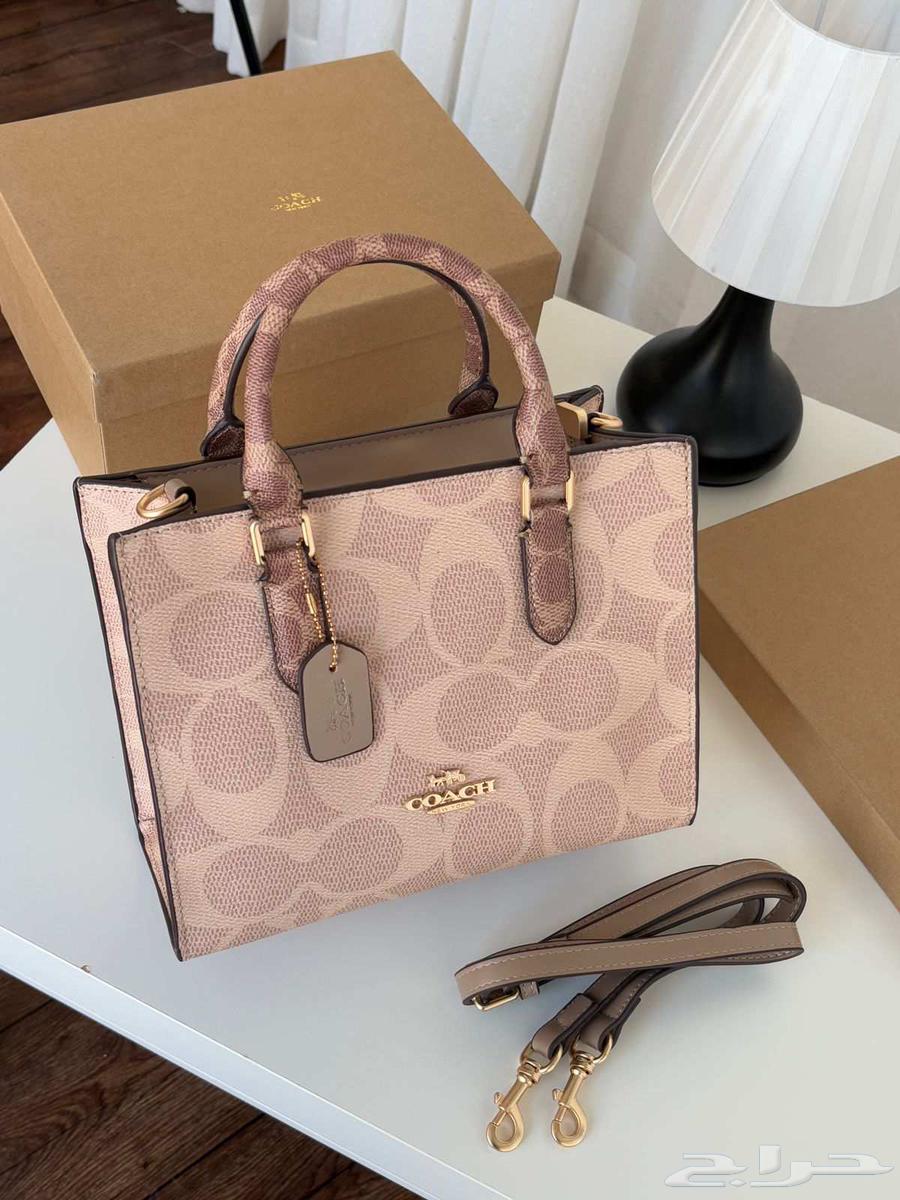 شنط ماركة كوتش درجه اولى64553737099393111