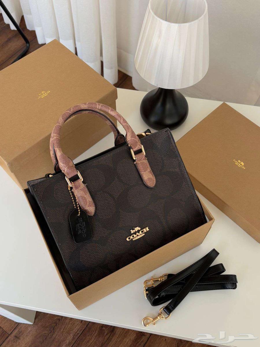 شنط ماركة كوتش درجه اولى64553737099393114