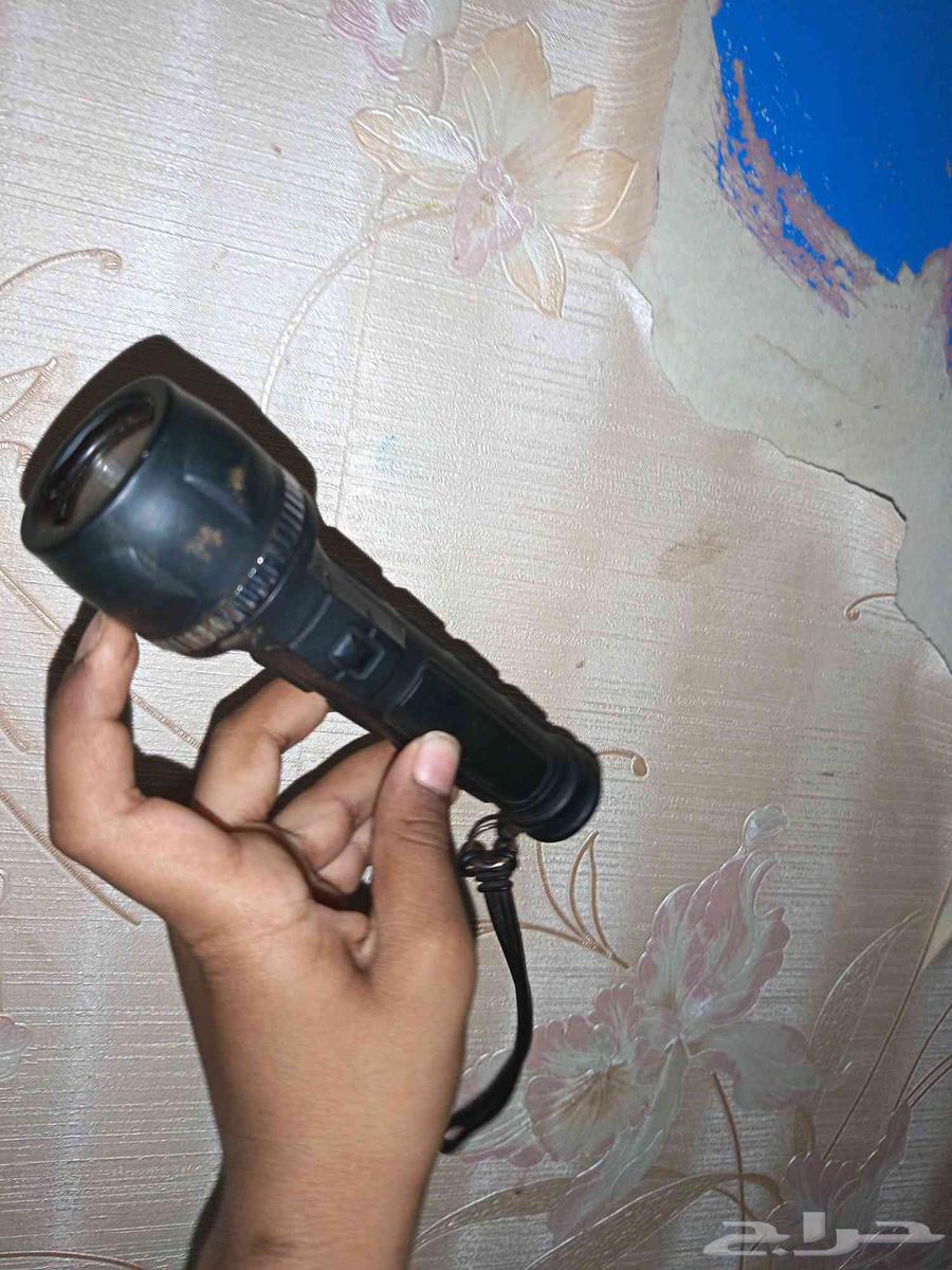 Antique flashlight priced at 50 riyals, works but needs its own battery64557085520641112