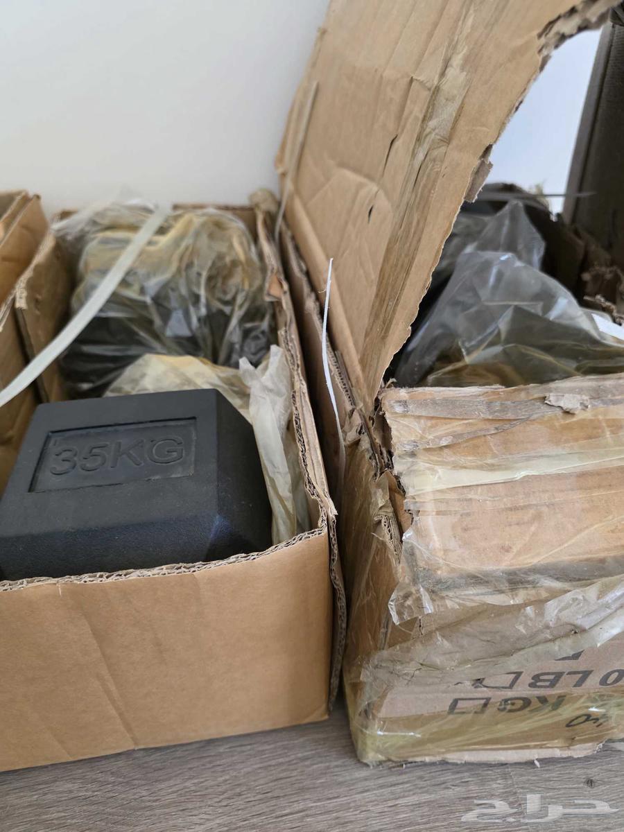 أوزان من الحديد الزهر جديدة وغير مستخدمه64556623596673110