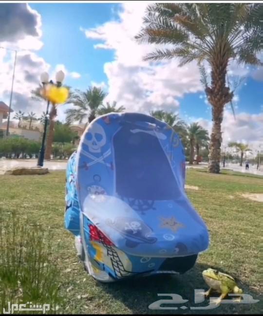 غطاء كارسييت يثبت عليه ليحمي الرضيع من البرد او التراب64570887392771113