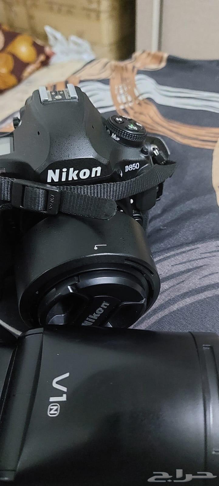 كاميرا 850 شبه جديده عدسة 50G شبه جديده فلاش v1 شبه جديد ل64566644882563111