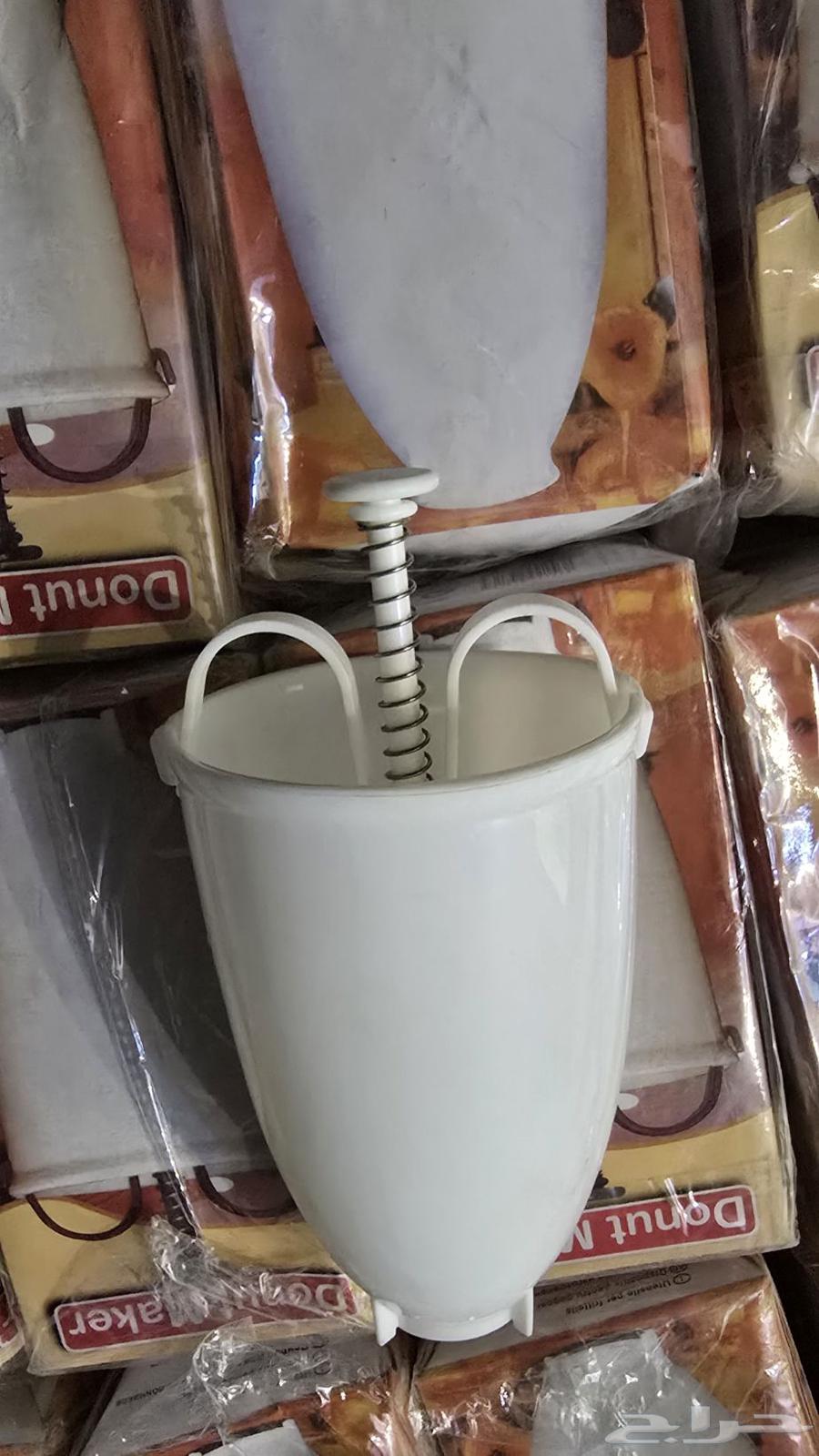 صانعة الدونات اليدويه 15حبه64563314396547112