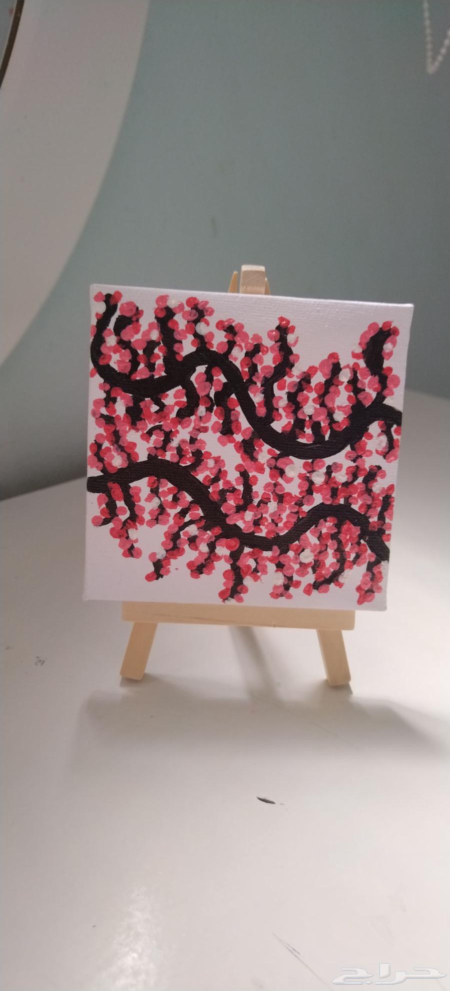 لوحه صغيره مرسوم عليها جذوع شجرة الكرز64574804311938111