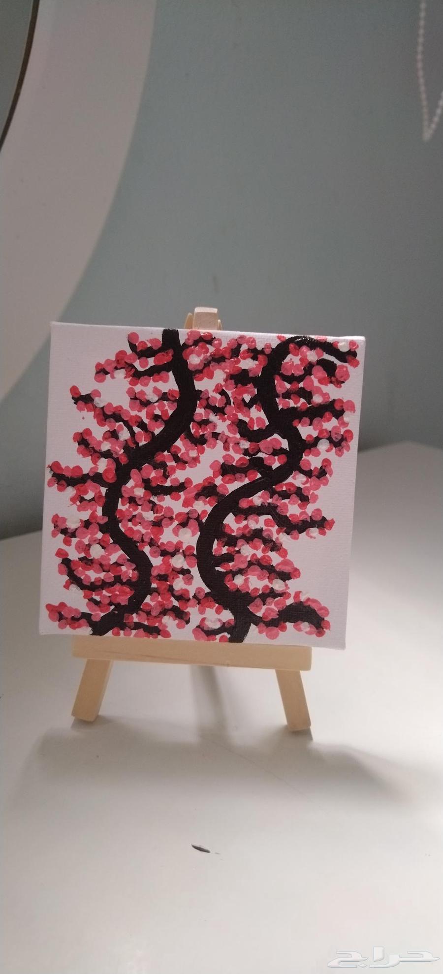 لوحه صغيره مرسوم عليها جذوع شجرة الكرز64574804311938110