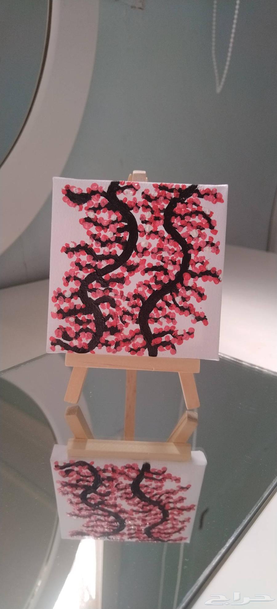 لوحه صغيره مرسوم عليها جذوع شجرة الكرز64574804311938113