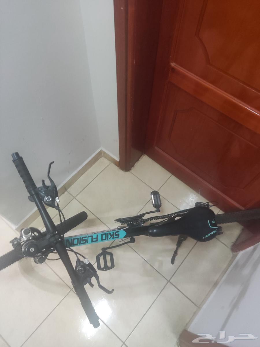 Skid Fusion bicycle in blue and black color with helmet and64575531691138112