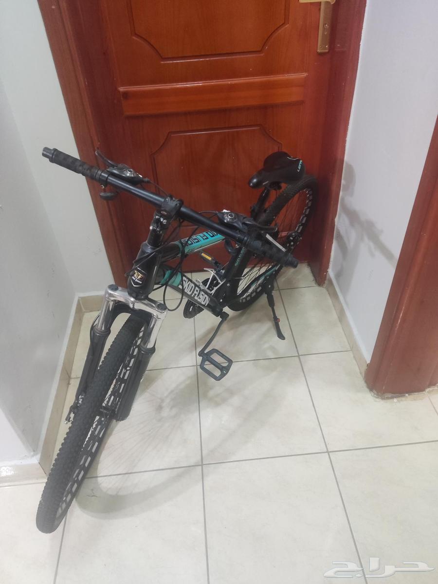 Skid Fusion bicycle in blue and black color with helmet and64575531691138110