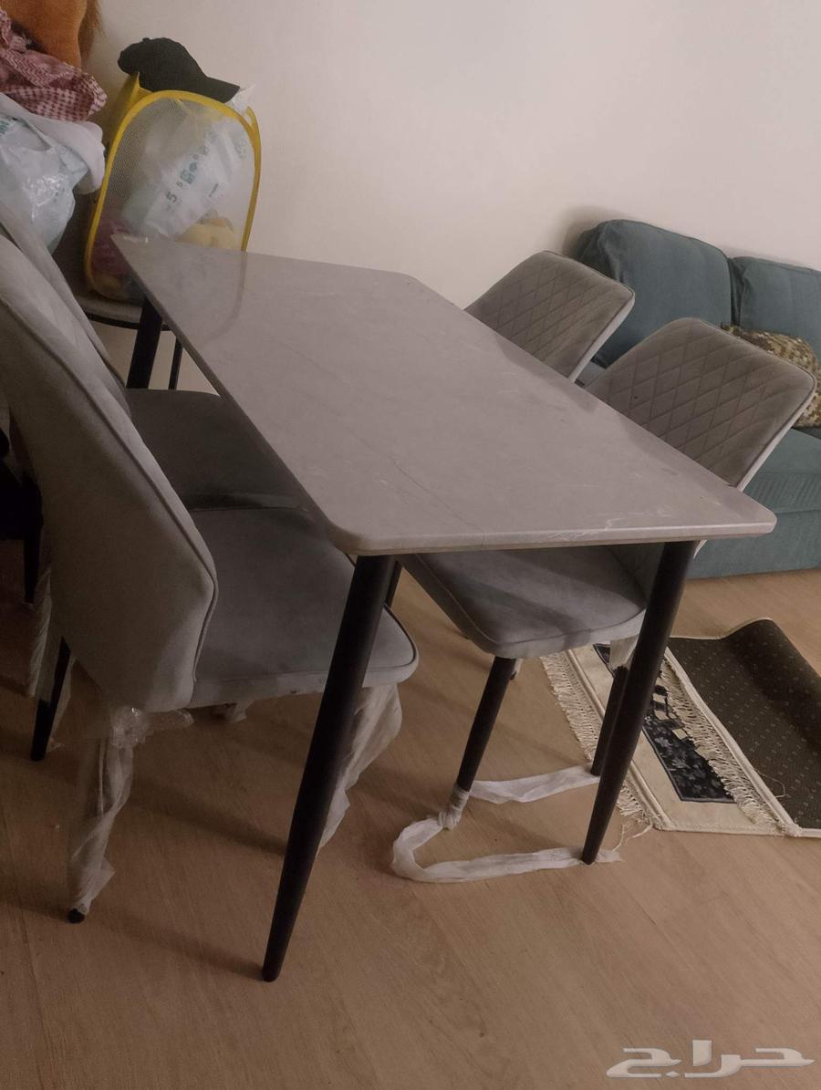 New dining table with four chairs, never used64572705830787111