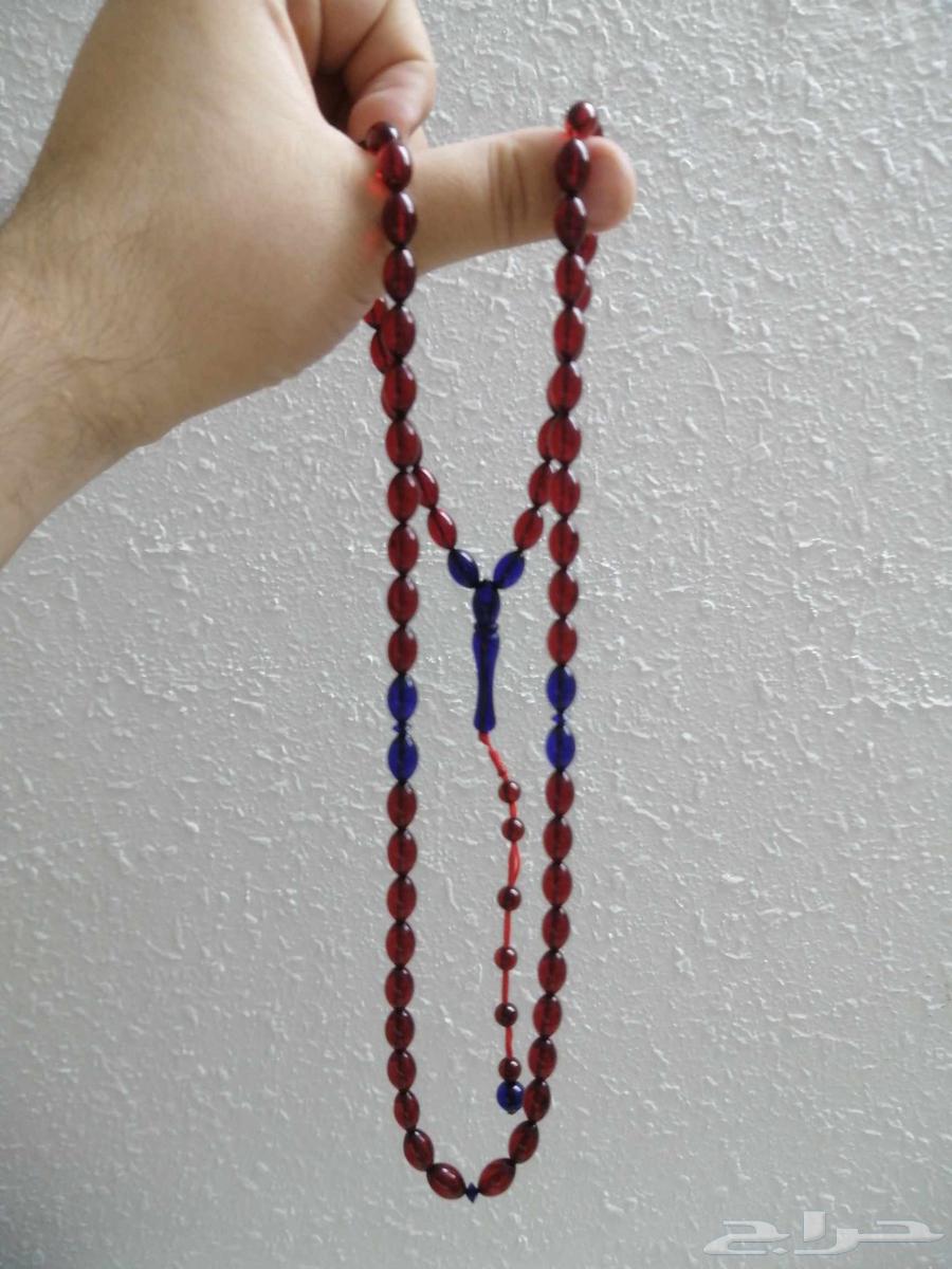 Amber rosary with deer blood color inlaid with blue amber (new).64587169614466111