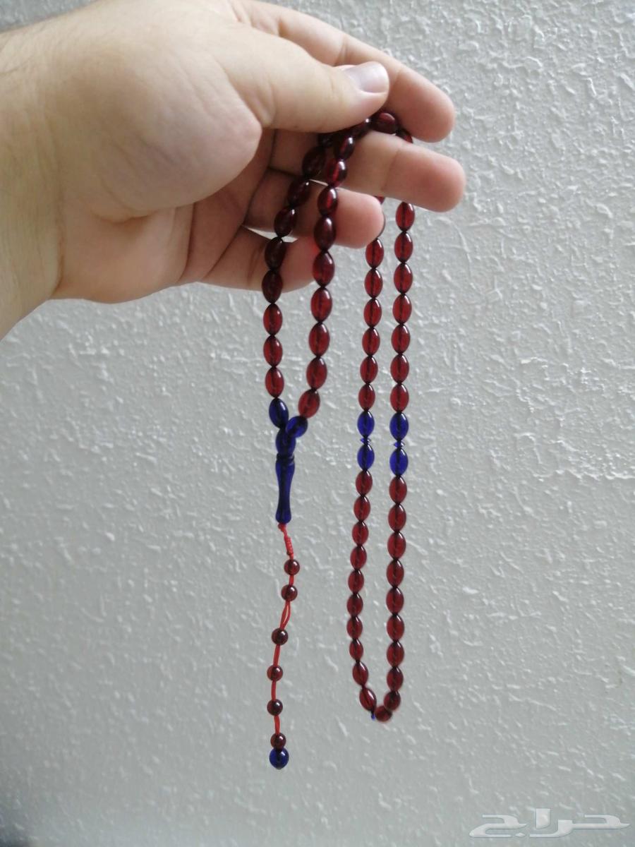 Amber rosary with deer blood color inlaid with blue amber (new).64587169614466110