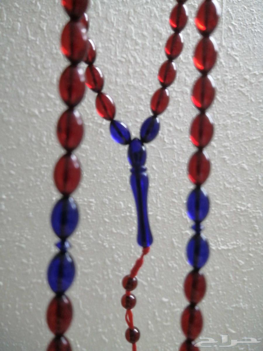 Amber rosary with deer blood color inlaid with blue amber (new).64587169614466113