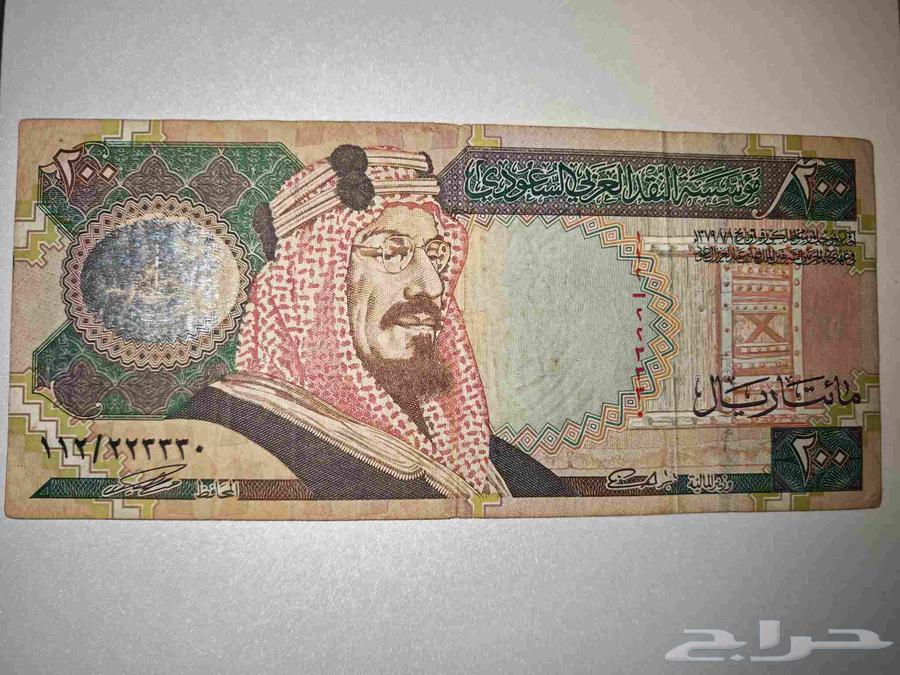 ورقة 200 ريال تذكارية إصدار 1419ه رقم شبه مميز 122233064583237108353110