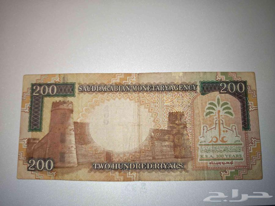 ورقة 200 ريال تذكارية إصدار 1419ه رقم شبه مميز 122233064583237108353111