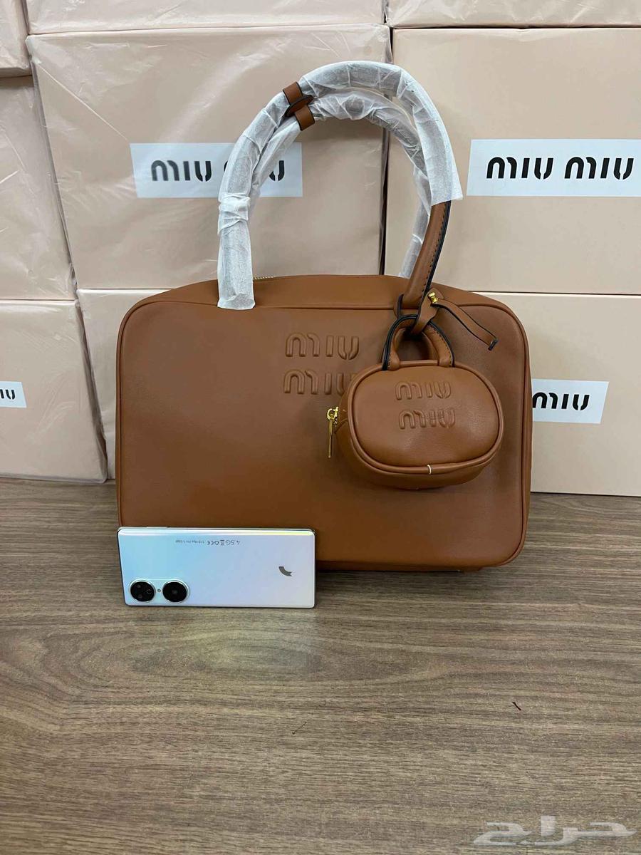 شنط تقليد ماركه ميو ميو و ماركة قوتشي64593301136898113