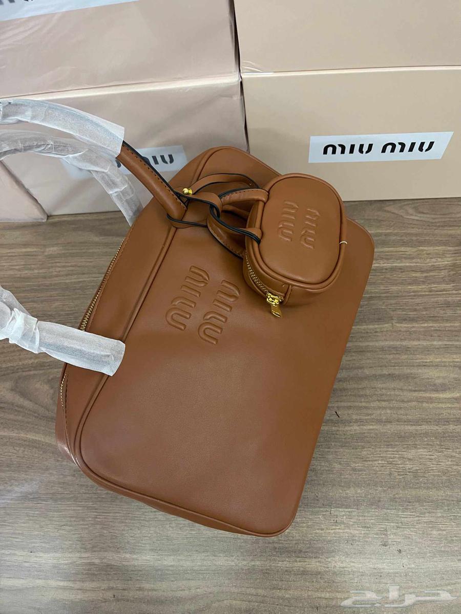 شنط تقليد ماركه ميو ميو و ماركة قوتشي64593301136898112